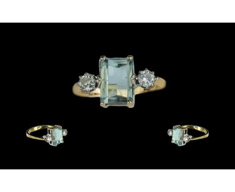 Ladies Attractive 9ct Gold - Aquamarine and Diamond 3 Stone Ring. Full Hallmark to Shank. The Step-cut Aquamarine of Sea - Bl