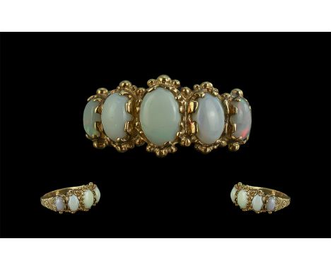 Ladies Attractive 9ct Gold Five Stone Opal Set Ring, ornate setting with pleasing quality opals; full hallmark to interior of