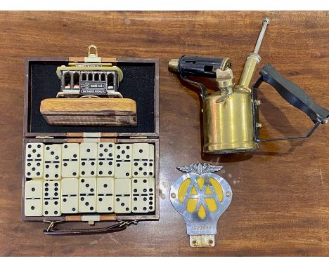 Box of Collectibles, including an AA Badge No. 1E23853, travelling Domino Set, a brass blow lamp, and a small cable car model