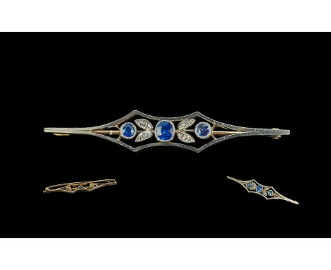 18ct Gold and Platinum Diamond &amp; Sapphire Set Bar Brooch, with original display box.  Blue sapphires of excellent colour.