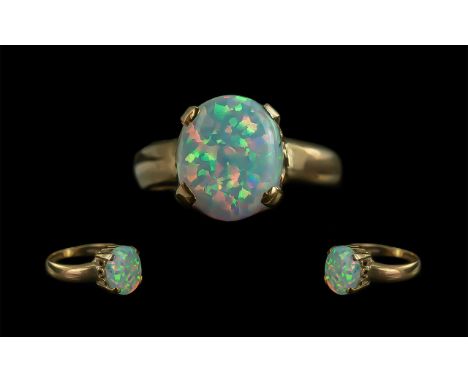 Ladies Attractive 9ct Gold Single Stone Opal Set Ring, marked 9.375 to shank; multi colour opal, ring size P/Q, weight 3.4g; 