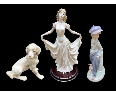 Three Pieces of Porcelain, comprising a Lladro figure No. 5400, depicting  boy with knotted hankie on a stick, measures 9" hi