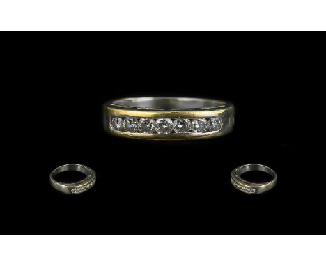 18ct Diamond Half Eternity Ring set with 7 round brilliant cut diamonds channel set stamped 750. Ring size K