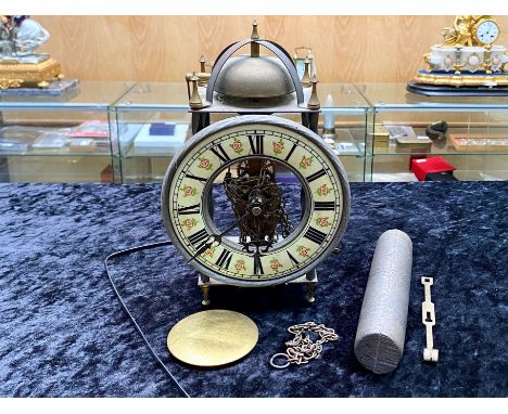 German Wall Clock, Roman numerals on ceramic rim decorated with flowers.  