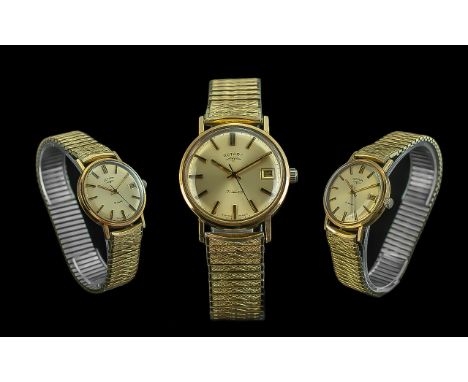 Rotary - Gents 21 Jewels Mechanical Wind Automatic 9ct Gold Cased Wrist Watch. Features Champagne Dial, Just / Date Display W