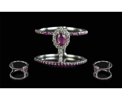 Ladies - 18ct White Gold Modern Fashion Rubies and Diamonds Set Ring of Unusual Form. The Rubies and Diamonds of Excellent Co