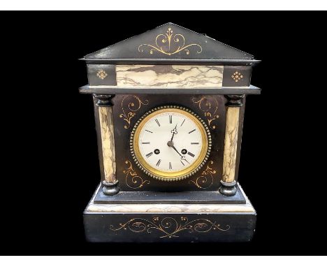 A 19th Century French Black Slate Architectural Clock, column supports and panels.  White enamel dial, Roman numerals. With k