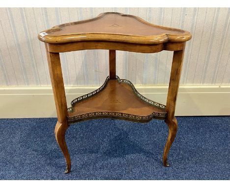 Mid Century French Style Two Tier Table, of shaped triangular form, bottom shelf with brass gallery.  Cabriole legs with ormo