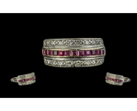 18ct Gold Ruby &amp; Diamond Ring, a central row of calibre cut rubies between two rows of brilliant cut diamonds.  Fully hal