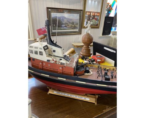 A Radio Controlled Ship, with engine, The Lady Laura Grimsby fishing boat.  30" long, good detail throughout.  Comes with mot