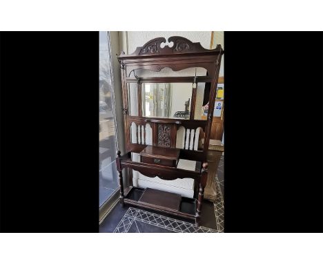 Traditional Wooden Hall Stand, with central mirror, coat hooks, drawer, umbrella/stick stand, carved top and back,  and barle