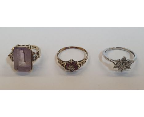 3 x 9ct rings, one yellow gold Amethyst and Diamond ring, one yellow gold Ruby and Diamond cluster ring, and one white gold D