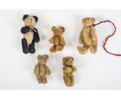5 Miniatur Teddys von SteiffArme, Beine und Kopf beweglich, altersbedingte Gebrauchsspuren. 7 bis 9 cm.