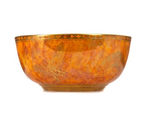 WEDGWOOD, BUTTERFLY &amp; PEACOCK LUSTRE BOWL CIRCA 1920-29 the interior gilt with peacocks to mottled purple ground, the ext