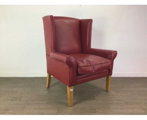 RED LEATHER WING BACK CHAIR CONTEMPORARY with square tapering oak legs110cm highUpholstery a little tired with some fading to