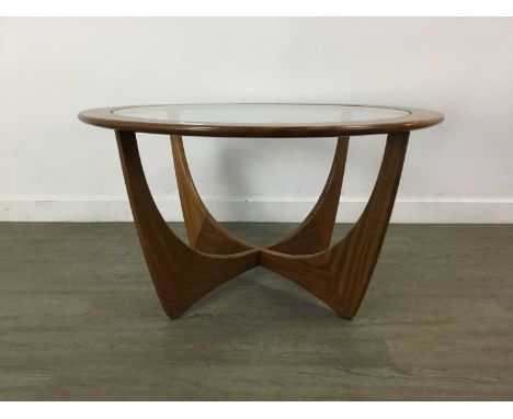 VICTOR WILKINS (BRITISH, 1878-1972) FOR G-PLAN, 'ASTRO' TEAK COFFEE TABLE CIRCA 1960-69 glass topped and raised on four angle