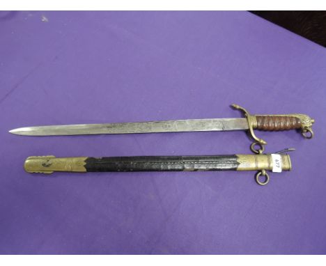 An early 20th century British Naval dirk in scabbard, condition of blade very good