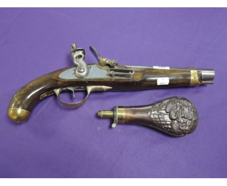 A very good replica flintlock pistol and an embossed copper powder flask by Bartram & Co