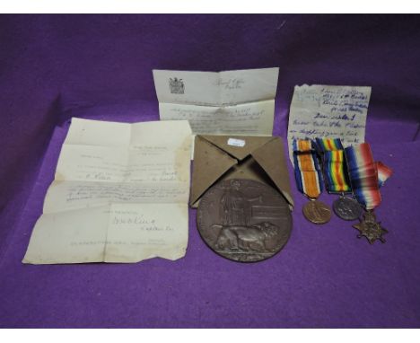 A World War I medal, Victory medal, 1914-1915 Star and Memorial plaque to 6618 Pte. Willson Bord. R. With paper work and a le