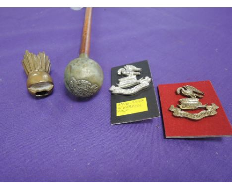 A Lancashire Fusilier swagger stick and three badges including a 1914 silver Liverpool Pals