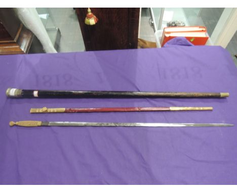 A G Kenning & son of London, Liverpool, Manchester, Glasgow, Masonic sword in scabbard housed in an ebonised walking cane