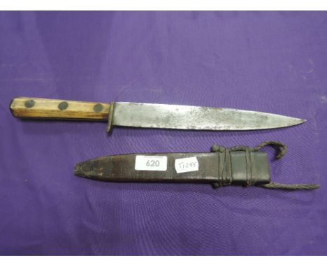A possibly 19th century single edge Bowie or Hunting knife with bone handle and leather sheath