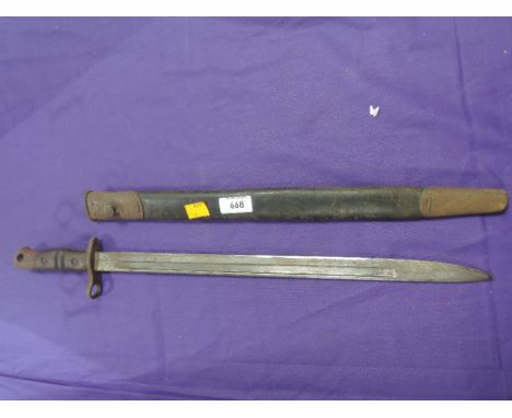 A World War I American Remmington bayonet pattern 1913, re issued to the home guard, with scabbard