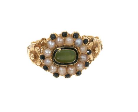 Georgian gold ring with central cabochon green stone surrounded by black enamel, seed pearls and jet, in gold closed-back set