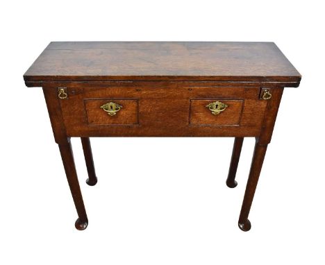 Unusual early 18th century oak card table, with fold-over top enclosing baize lined playing surface, on turned legs and pad f