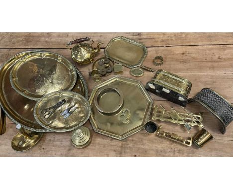 Collection of antique brass including miniature fire kerbs and tools, trays and sundriesProvenance: The Angela Kay Collection
