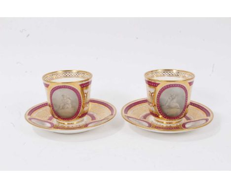 Pair of good quality 19th century English porcelain coffee cups and saucers, painted en grisaille with roundels containing ch