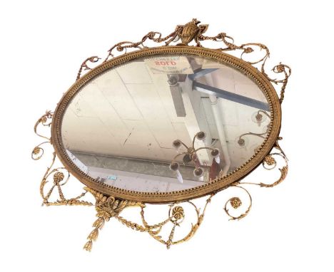 19th century neo-classical wall mirror, oval plate in scrolled foliate surround issuing from urn surmount, 128 x 119cm