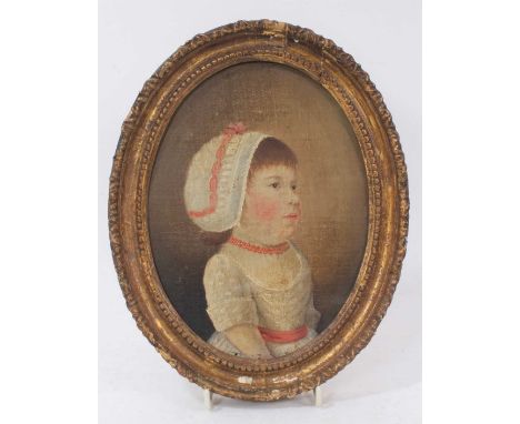 Early 19th century oil on canvas naive school portrait of a child, oval 20 x 15cm, gilt frameProvenance: The Angela Kay Colle