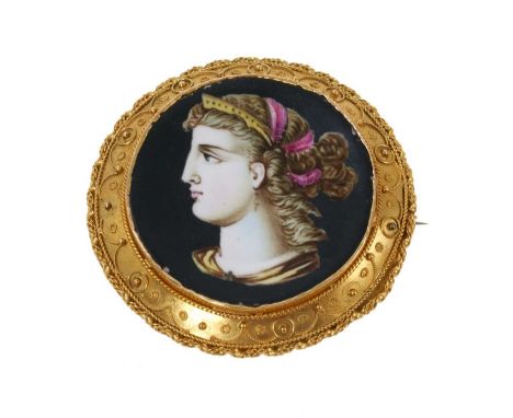 Victorian Etruscan Revival brooch with painted porcelain panel depicting a female bust, in circular gold mount with applied f