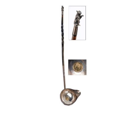 Victorian silver ladle, with large bowl and pouring lip, the bowl inset with a George IV gold half sovereign coin, with twist