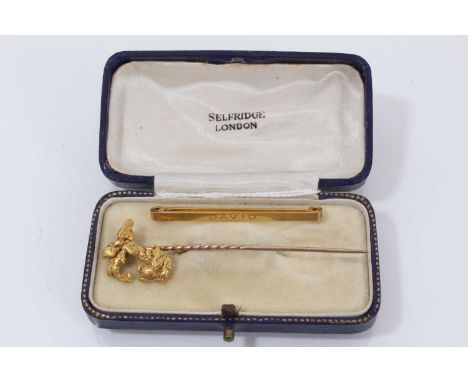 Early 20th century gold ‘nugget’ stick pin and a 9ct gold tie pin ‘David’ (2)  The stick pin weighs approximately 4.25 gramsT