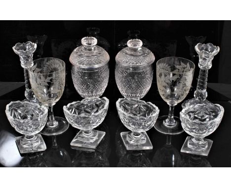 Group of 19th century cut glass, including a set of four salts, a pair of sweetmeats and covers, a pair of candlesticks and a