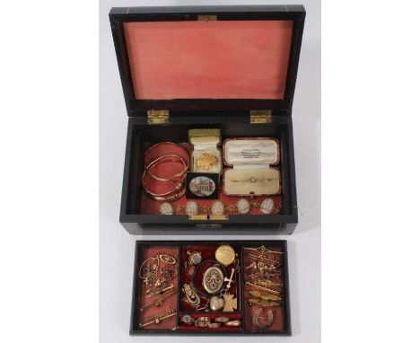 A Victorian jewellery box containing a good group of Victorian and Edwardian jewellery to include three gold hinged bangles, 