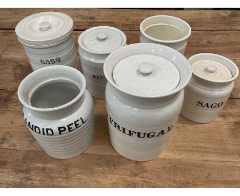Group of six late 19th/early 20th century white glazed kitchen storage jars, each with unusual titles, including 'Centrifugal