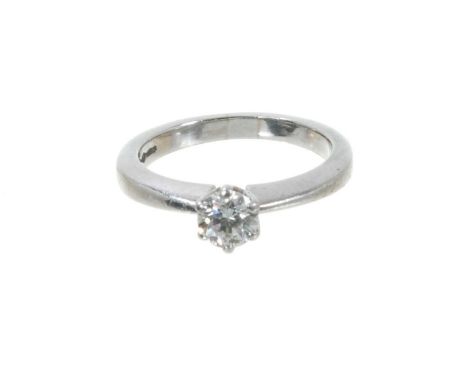 Diamond single stone ring, the round brilliant cut diamond estimated to weigh approximately 0.52cts in six claw setting on pl