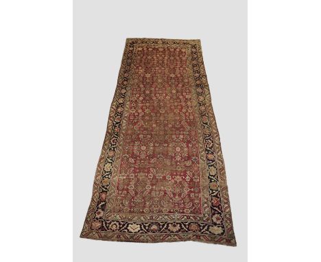 Karabakh kelleh, south west Caucasus, late 19th/early 20th century, 16ft. 8in. X 6ft. 4in. 5.08m. X 1.93m. Overall wear, heav