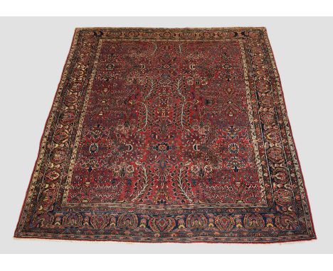 Good Saruk carpet, north west Persia, circa 1930s, 11ft. 6in. X 9ft. 5in. 3.50m. X 2.87m. Light red field with all over flowe