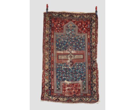 Shirvan prayer rug, south east Caucasus, early 20th century, 5ft. 4in. X 3ft. 1in. 1.63m. X 0.94m. Overall wear, heavy in pla