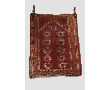 Two rugs, first half 20th century, the first: an Ersari Turkmen prayer rug, north east Afghanistan, 3ft. 2in. X 2ft. 6in. 0.9