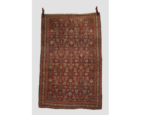 Malayer rug, north west Persia, early 20th century, 5ft. 10in. X 3ft. 9in. 1.78m. X 1.14m. Overall even wear; part of main bo