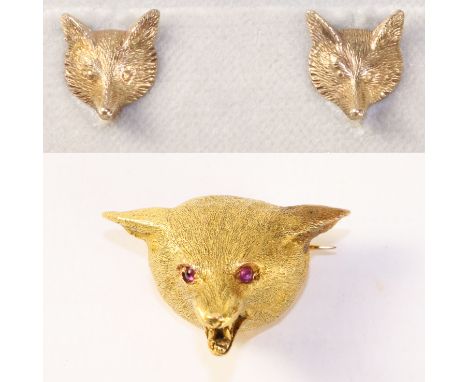 Fox mask brooch with ruby eyes tested to 15ct and a pair of ear studs stamped 9ct retailed by Mappin & Webb   Condition Repor