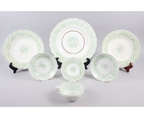 A Rockingham porcelain teacup, saucer, two dessert plates, tureen stand and two shallow bowls, decorated birds and foliage in