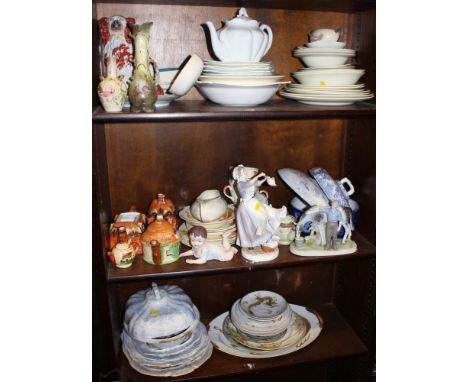 A Shelley white glazed teapot, a quantity of Susie Cooper "Dresden" spray patterned plates, three figures, Japanese china and