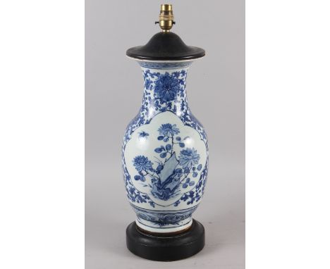 A Chinese blue and white baluster shaped table lamp, 12 1/2" high, a studio pottery table lamp and a clown shaped table lampC