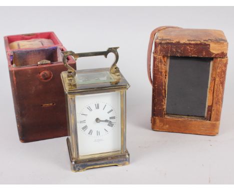 A brass cased five-window carriage clock with white enamel dial and Roman numerals by W Caney, 4 1/2" high, in travelling cas
